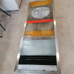 Table basse soleil signée R. Capron