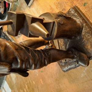 BOURET Eutrope, Bronze  Forgeron en tablier " LE TRAVAIL " .