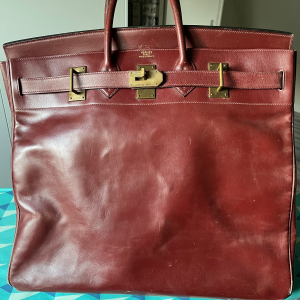 Sac de voyage Hermès rouge en cuir d'occasion