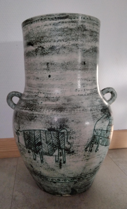 
															Vase en poterie
														