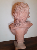 
													Buste de femme en terre cuite
												