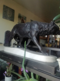 
													Bronze loup marchant dans la neige de Valton
												