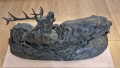
													Sculpture en bronze de cerfs en combat
												
