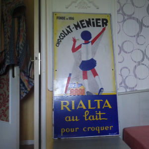 Plaque publicitaire émaillée