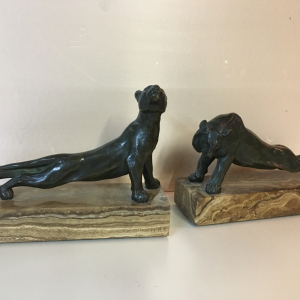 serre livres en bronze lions s'étirant oscard waldmann