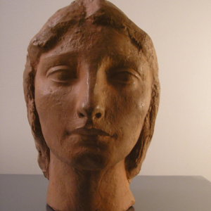 Portrait de jeune femme en terre cuite vers 1905 - 1910