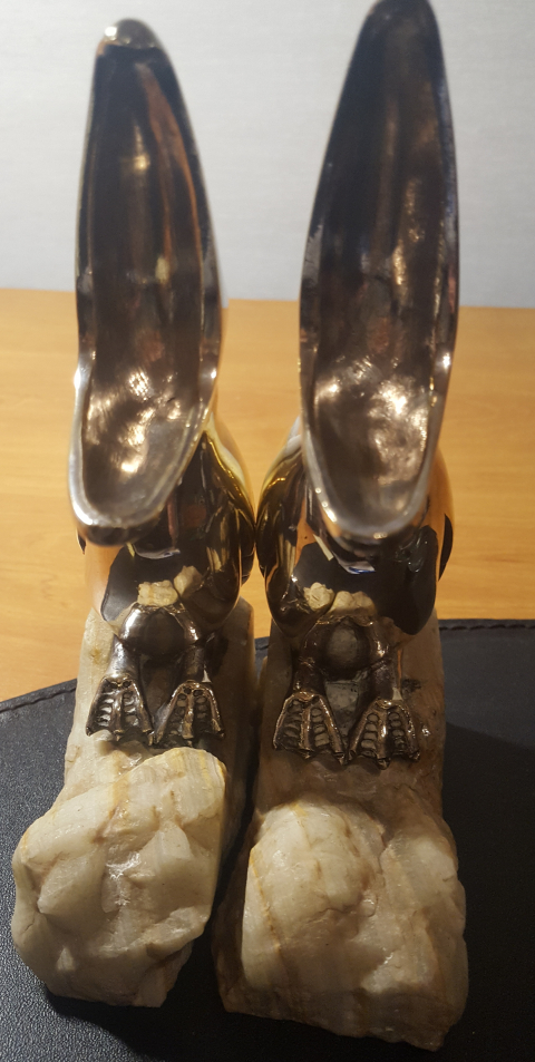 
															Serre livres bronze patine argent sur socle marbre
														