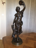 
															Statue en bronze
														