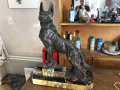 
															Scupture loup chien carvin
														